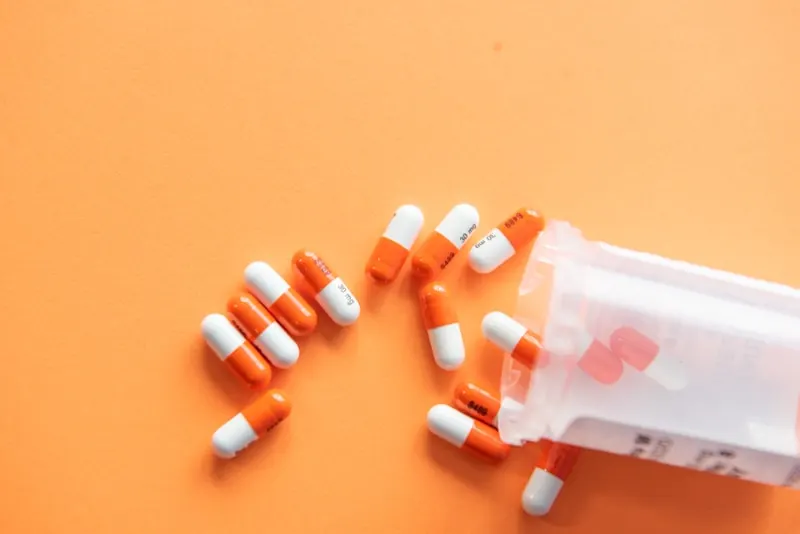 Pharmacy shelves stocked with medicines